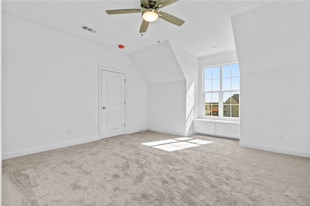 bonus room with ceiling fan, carpet, and lofted ceiling