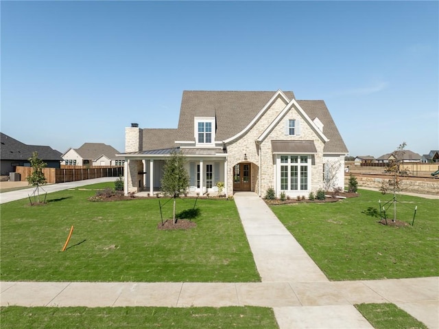 view of front of house with a front lawn