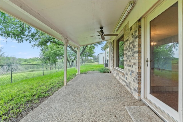 view of patio featuring ceiling fan