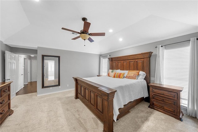 bedroom featuring vaulted ceiling, ornamental molding, light carpet, and ceiling fan