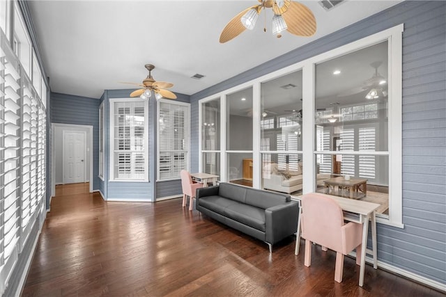 interior space featuring ceiling fan