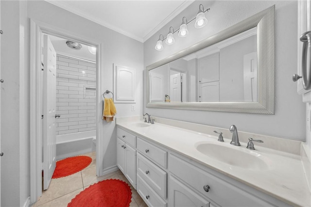 bathroom featuring tile patterned flooring, crown molding, vanity, and tiled shower / bath