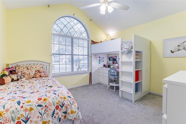 bedroom featuring lofted ceiling, light colored carpet, and ceiling fan