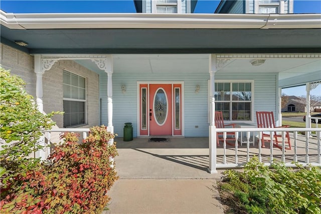 doorway to property featuring a porch