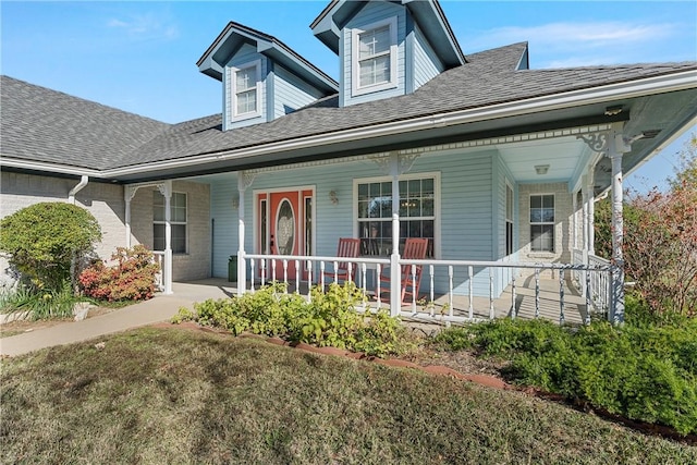 cape cod home with covered porch