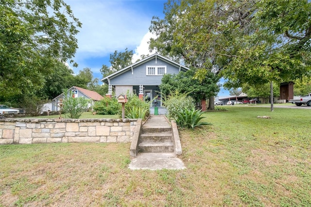 view of front of home with a front lawn