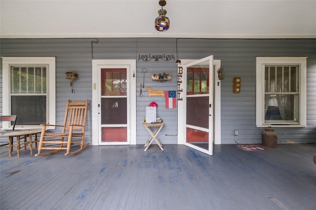 doorway to property with a porch