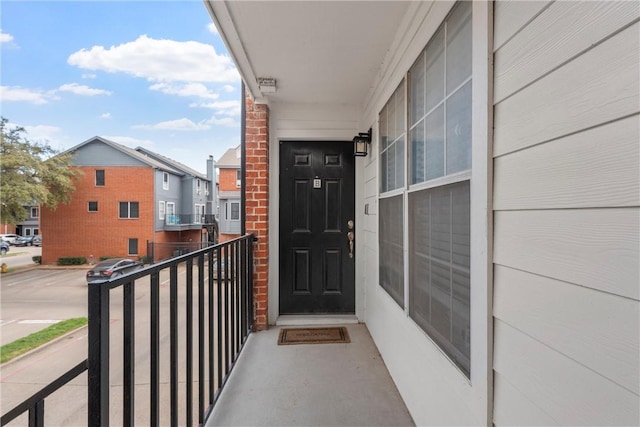 doorway to property with a balcony