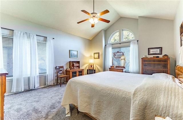 carpeted bedroom featuring lofted ceiling and ceiling fan