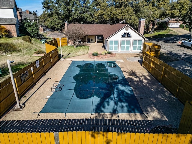 view of swimming pool featuring a patio