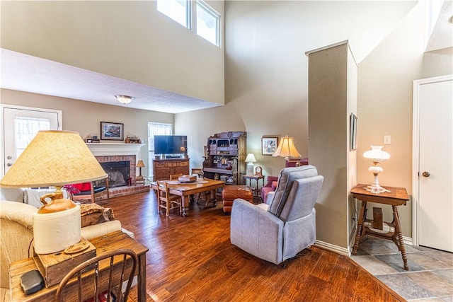 living room featuring a fireplace and hardwood / wood-style flooring