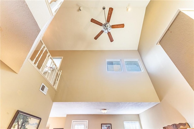 interior space featuring ceiling fan