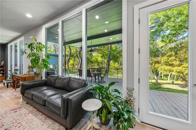 interior space featuring a wealth of natural light and hardwood / wood-style floors