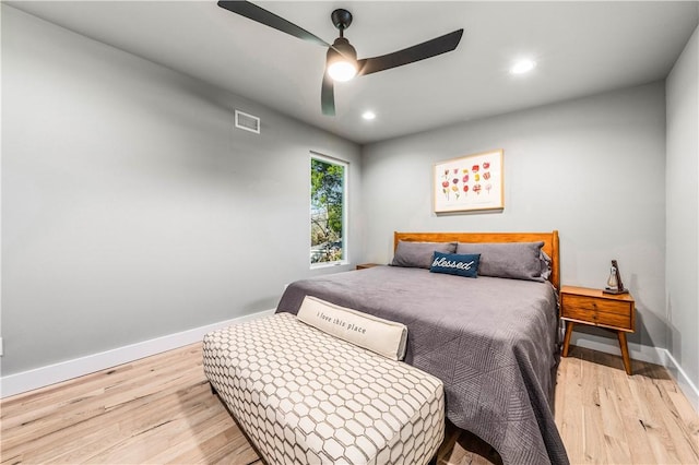 bedroom featuring ceiling fan and light wood-type flooring