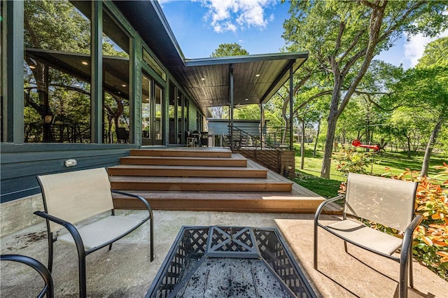 view of patio / terrace featuring a wooden deck