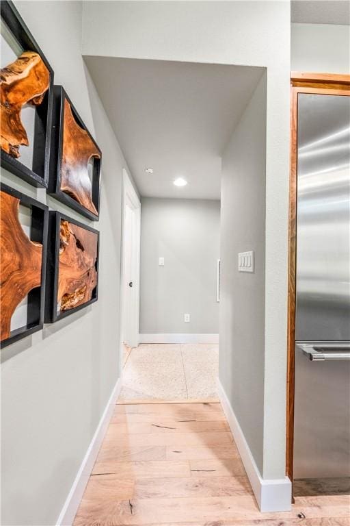 hall featuring light wood-type flooring