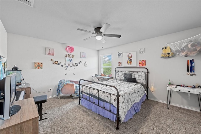 bedroom with ceiling fan and carpet