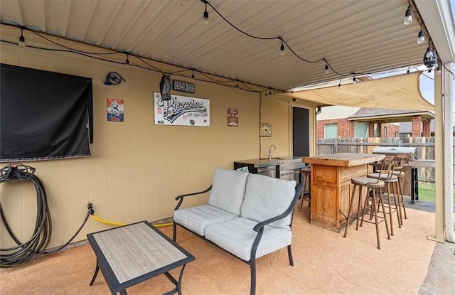 exterior space with an outdoor hangout area and an outdoor wet bar