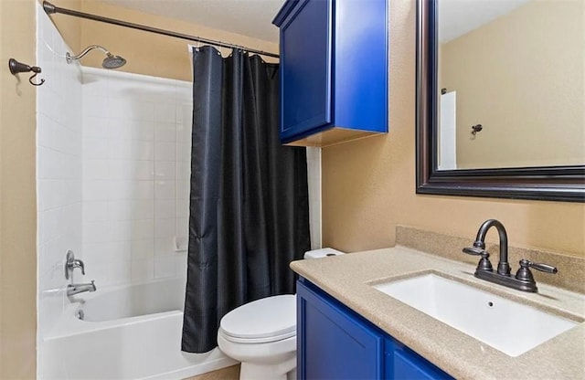 full bathroom featuring vanity, shower / bath combo, and toilet