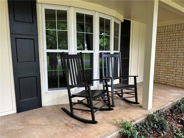 view of patio featuring a porch