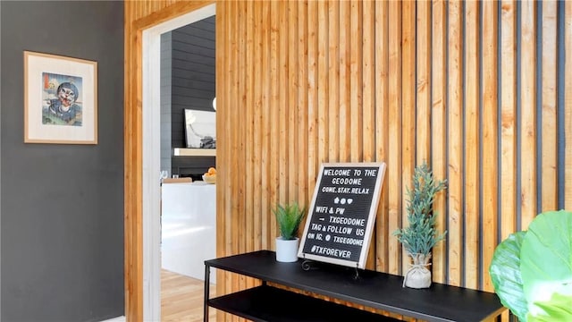 corridor featuring hardwood / wood-style floors