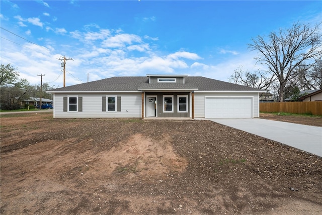 view of front of home with a garage