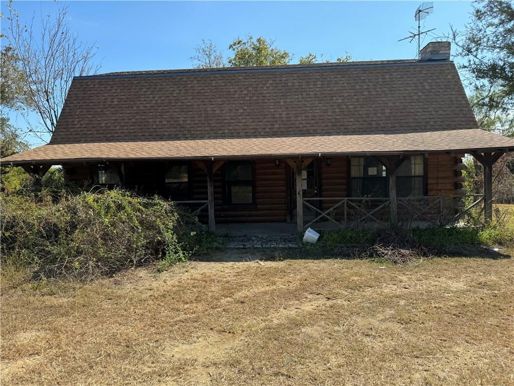 view of log cabin