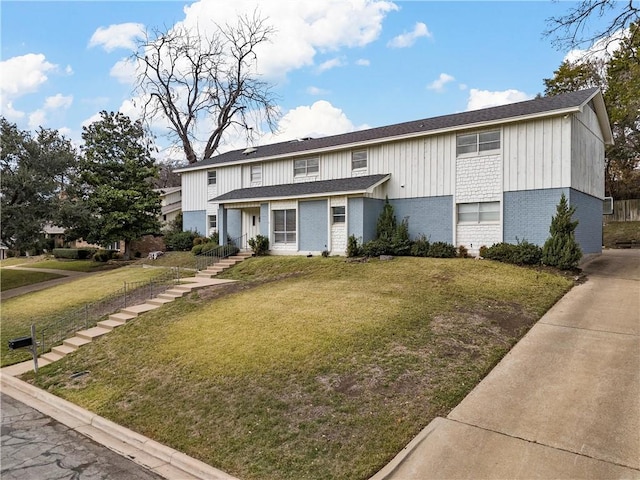 view of front of property with a front lawn