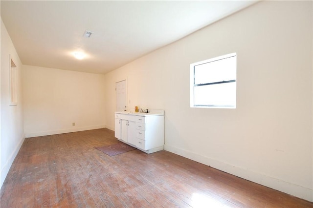 interior space with hardwood / wood-style floors