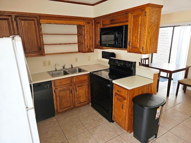 kitchen with sink, light tile patterned floors, black appliances, and ornamental molding