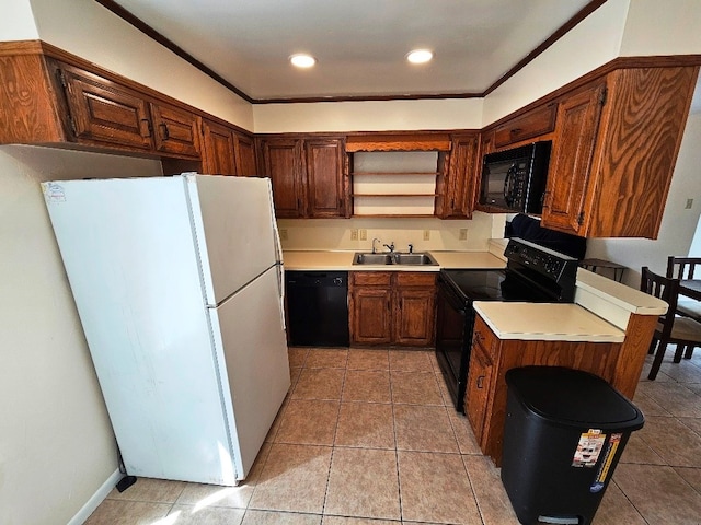 kitchen featuring black appliances, ornamental molding, sink, and light tile patterned floors