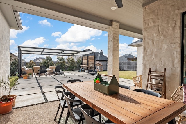 view of patio featuring a pergola