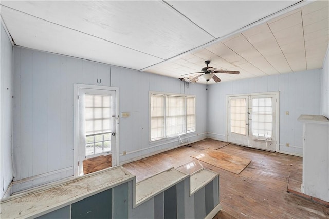 interior space featuring ceiling fan and wood-type flooring