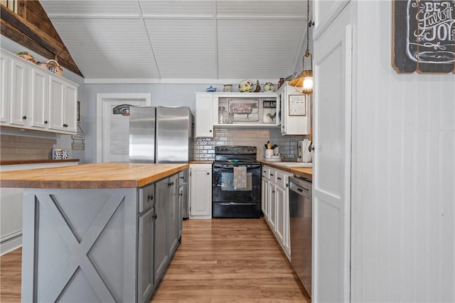 kitchen with gray cabinetry, wood counters, white cabinetry, light wood-style floors, and appliances with stainless steel finishes