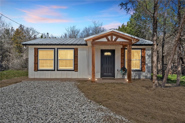 view of front of house featuring metal roof