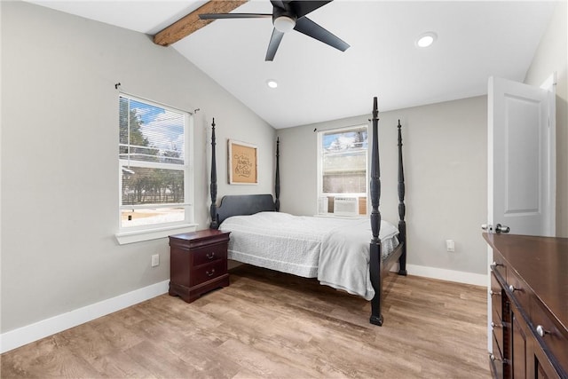 bedroom with vaulted ceiling with beams, light wood finished floors, a ceiling fan, and baseboards