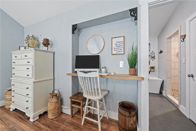 office featuring baseboards and dark wood-style flooring