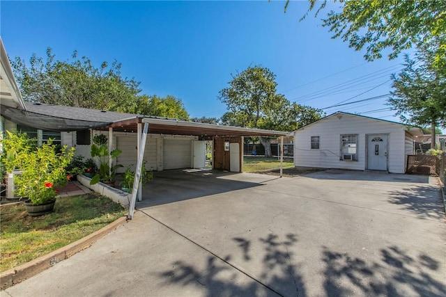 view of front facade with a carport