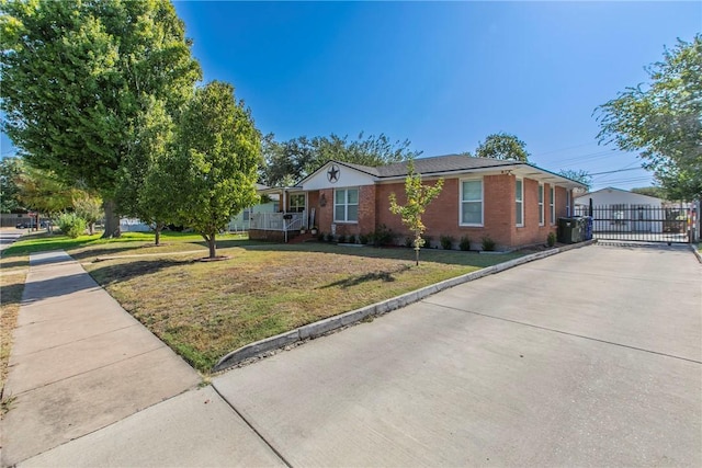 ranch-style house with a front yard