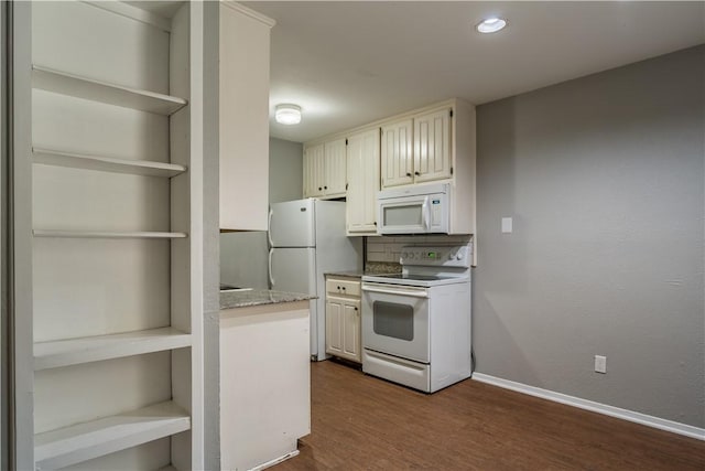 kitchen featuring white appliances, dark wood-type flooring, and tasteful backsplash