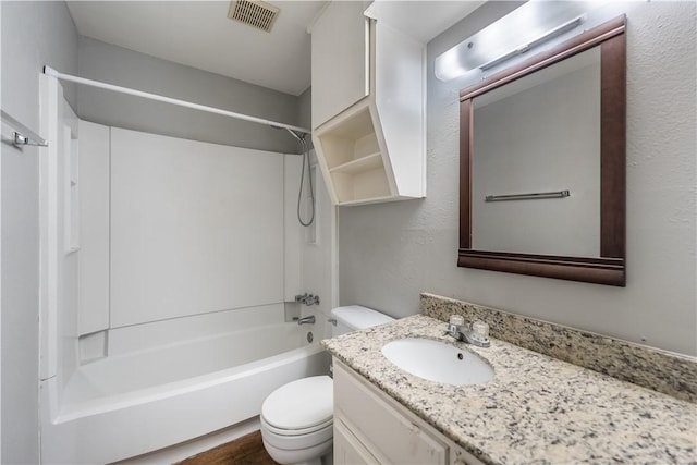 full bathroom featuring shower / bathing tub combination, vanity, and toilet