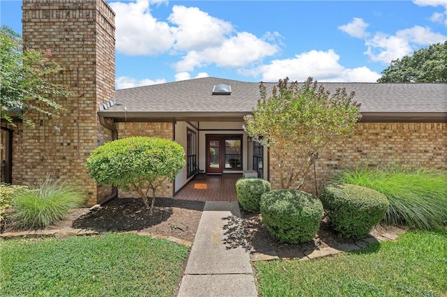 entrance to property featuring french doors