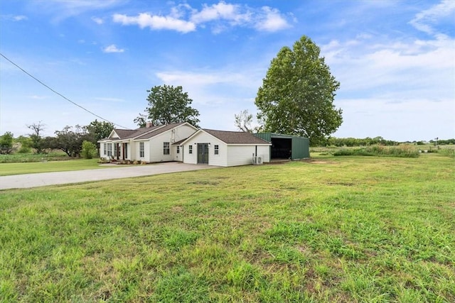 ranch-style home with a front yard