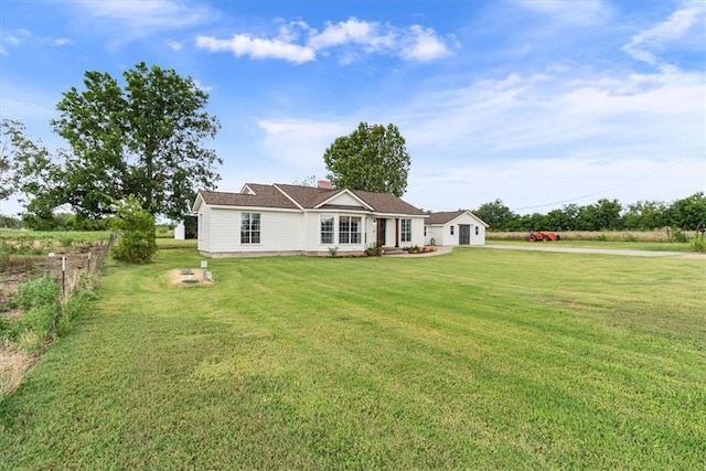 view of front of property with a front lawn