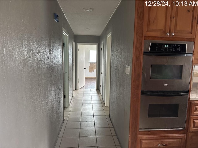 interior space featuring light tile patterned floors