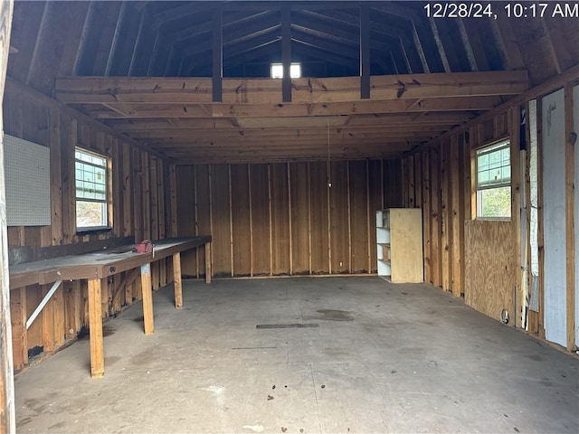 interior space with vaulted ceiling and a healthy amount of sunlight