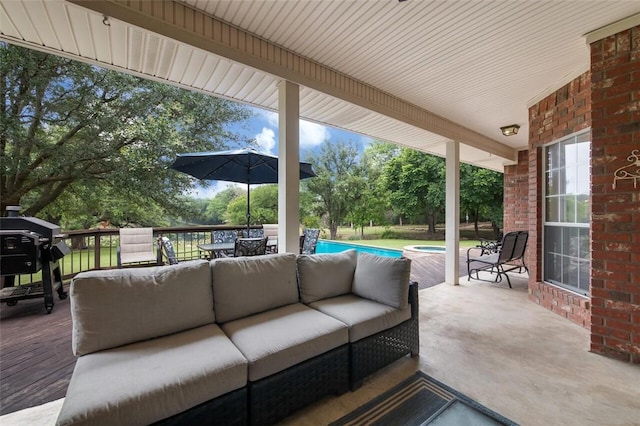 view of patio / terrace with a grill and outdoor lounge area