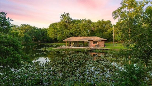 exterior space with a water view