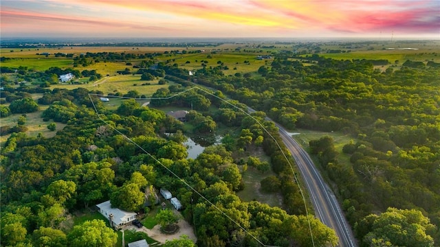 aerial view at dusk with a rural view