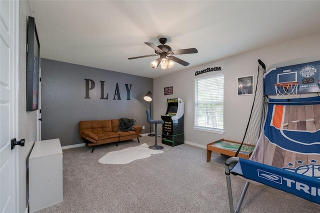 playroom featuring carpet and ceiling fan